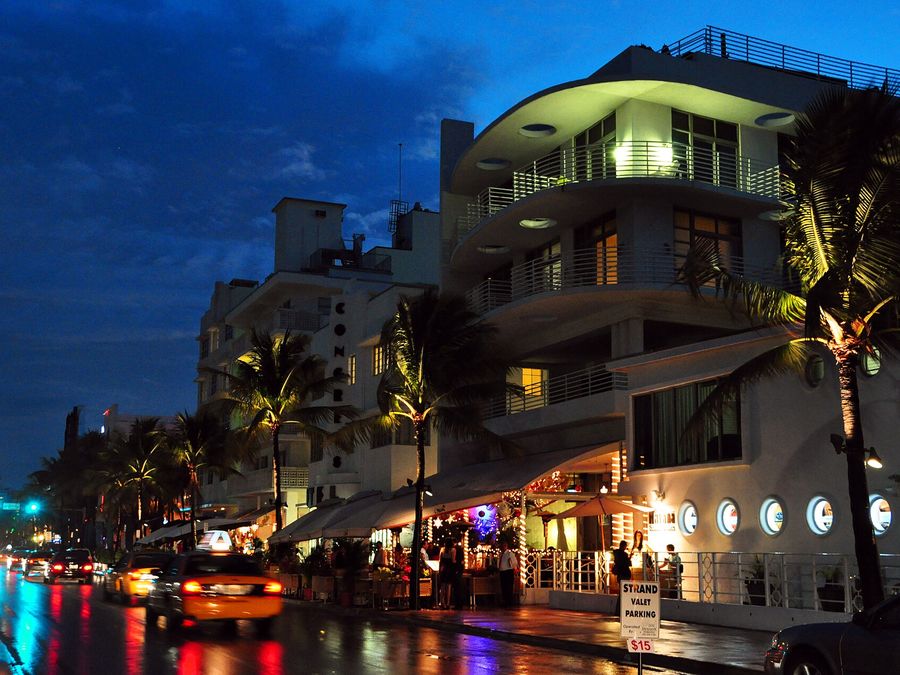 Ocean Drive, South Beach, lit up in neon at dusk