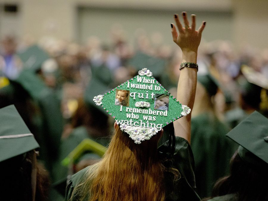 Graduates in caps and gowns at commencement