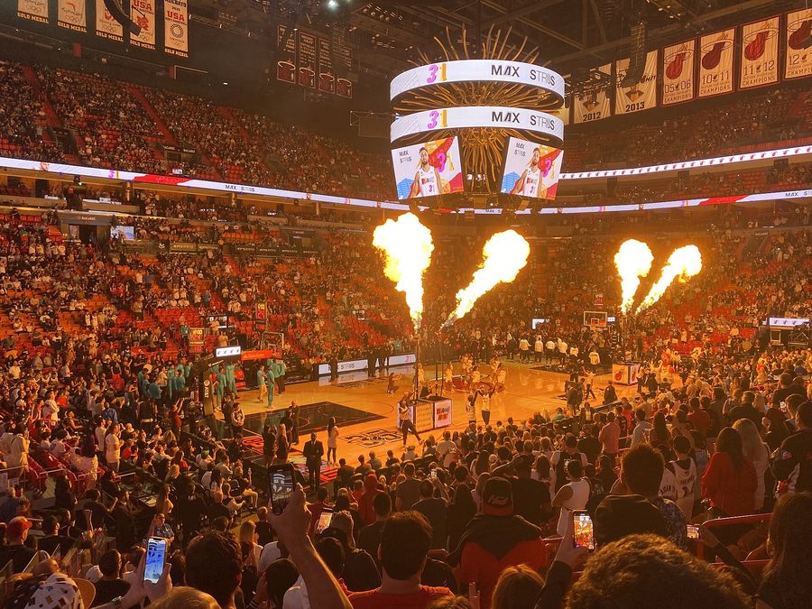 Basketball arena with flames during player introductions
