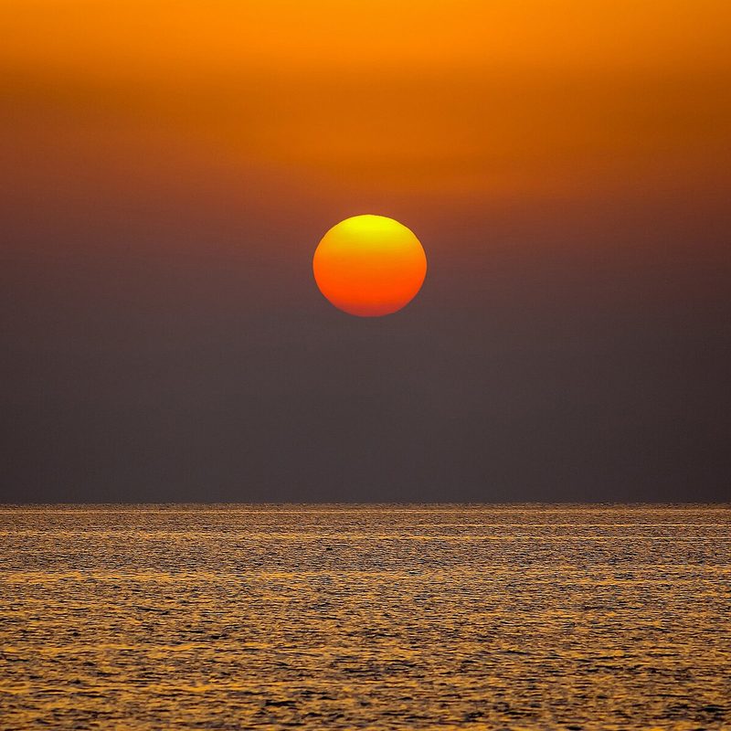 Sun low over the Red Sea at golden hour